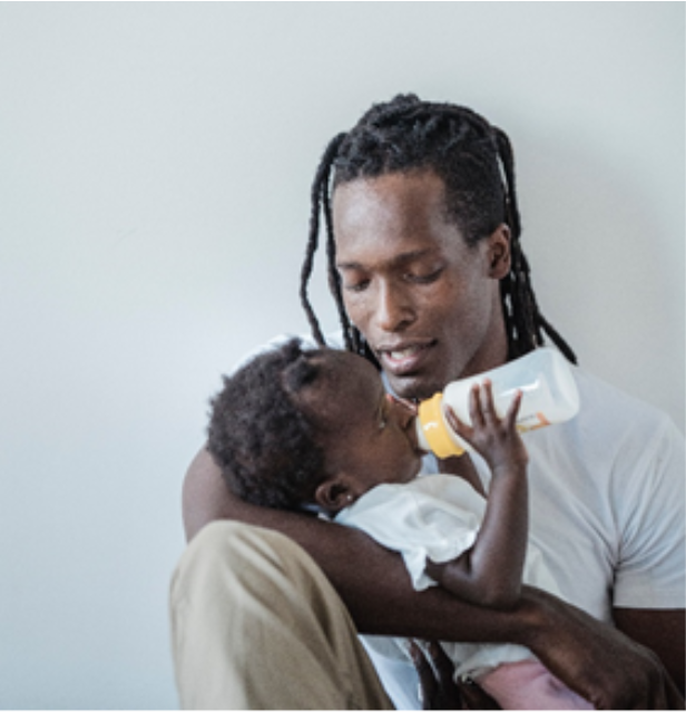 dad holding baby