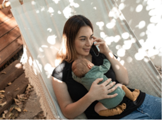 mom holding baby