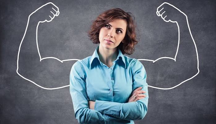 person folding hands with image of same person hold up hands with muscles
