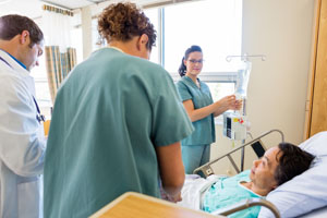 Team of doctors with patient